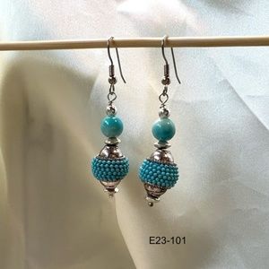 Turquoise colored beaded earrings